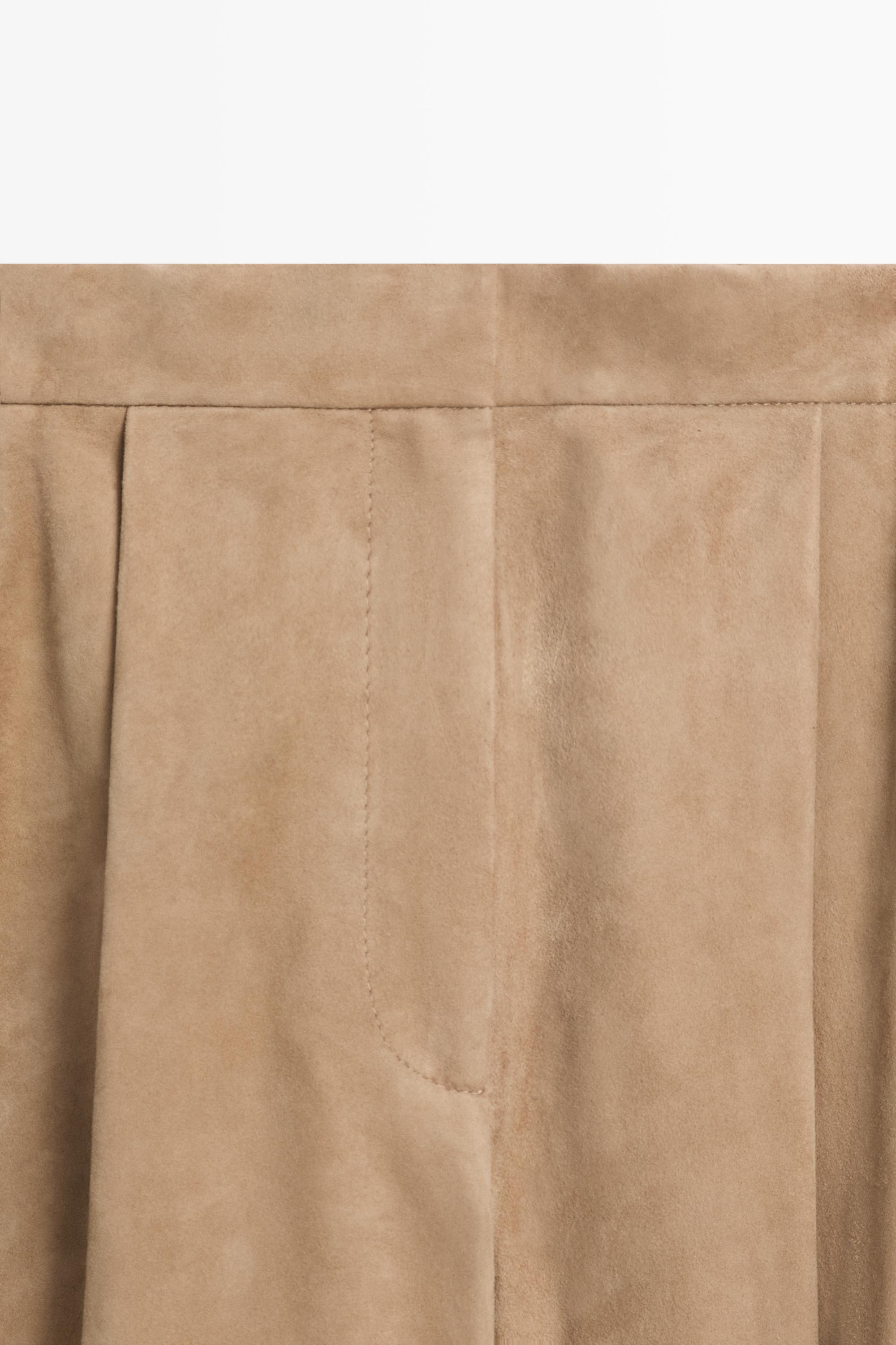 Suede leather pants with tie-detail hems